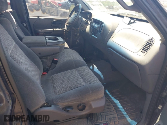 2001 Ford F-150 XLT с VIN 1FTRW07L41KA09067, выставлен на аукционе IAAI как лот 42459211 с пробегом 269 113 миль миль и . История ставок и продаж доступна на DreamBid. Изображение 5.