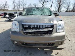 2007 GMC Yukon SLT with VIN 1GKFK13027J130960, listed as a Copart auction lot 49958035 with 0 mi miles and Salvage Title. Bid and sale history available at carsss.com. Image 5.