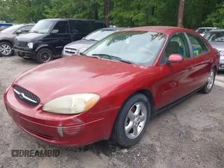 2000 Ford Taurus SES with VIN 1FAFP55U9YA136718, listed as a IAAI auction lot 42119103 with 158,166 mi miles and . Bid and sale history available at DreamBid. Image 2.