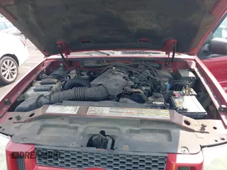 2001 Ford Explorer Sport Trac z VIN 1FMZU67E51UC90080, wystawiony jako IAAI lot #42358168 z przebiegiem 194 857 mil mil oraz . Historia ofert i sprzedaży dostępna na DreamBid. Obrazek 10.