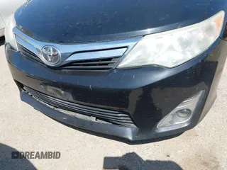 2014 Toyota Camry L with VIN 4T4BF1FK3ER413537, listed as a IAAI auction lot 42015577 with 181,592 mi miles. Bid and sale history available at carsss.com. Image 6.