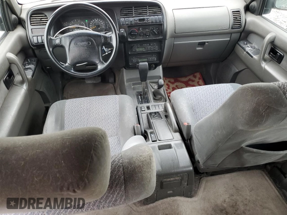 1997 Isuzu Trooper с VIN JACDJ58V6V7907294, выставлен на аукционе Copart как лот 56701575 с пробегом 218 644 миль миль и Списание • Salvage title. История ставок и продаж доступна на DreamBid. Изображение 8.