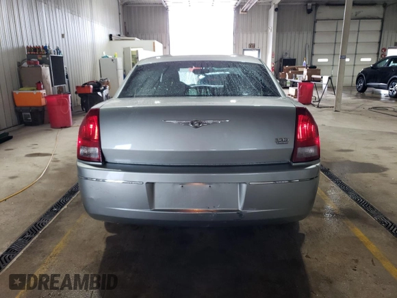 2005 Chrysler 300 with VIN 2C3JA53G65H556313, listed as a Copart auction lot 51839305 with 124,358 mi miles and Salvage Title. Bid and sale history available at carsss.com. Image 6.