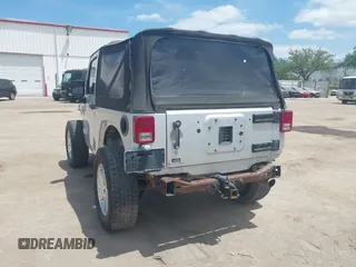 2009 Jeep Wrangler X with VIN 1J4FA24189L755392, listed as a IAAI auction lot 42176130 with 97,644 mi miles and . Bid and sale history available at DreamBid. Image 3.