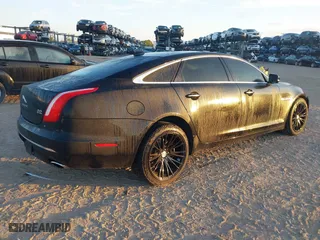 2018 Jaguar XJ with VIN SAJWJ2GD3J8W15092, listed as a IAAI auction lot 41844106 with 56,357 mi miles. Bid and sale history available at carsss.com. Image 4.