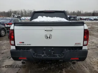 2021 Honda Ridgeline Sport with VIN 5FPYK3F15MB018801, listed as a Copart auction lot 60454925 with 28,032 mi miles and Salvage title. Bid and sale history available at DreamBid. Image 6.
