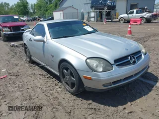 1999 Mercedes-Benz SLK 230/320 with VIN WDBKK47F9XF136119, listed as a IAAI auction lot 42462836 with 137,586 mi miles and . Bid and sale history available at DreamBid. Image 1.