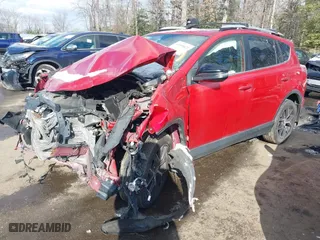 2016 Toyota RAV4 SE with VIN JTMJFREV2GJ073953, listed as a IAAI auction lot 41359423 with 98,641 mi miles. Bid and sale history available at carsss.com. Image 2.