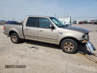 2001 Ford F-150 XLT z VIN 1FTRW07L01KB30498, wystawiony jako Copart lot #57157585 z przebiegiem 343 041 mil mil oraz Szkoda całkowita • Salvage title. Historia ofert i sprzedaży dostępna na DreamBid. Obrazek 4.