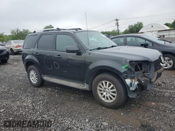 2011 Mercury Mariner Premier z VIN 4M2CN9HG1BKJ00209, wystawiony jako Copart lot #57016475 z przebiegiem 224 019 mil mil oraz Szkoda całkowita • Salvage title. Historia ofert i sprzedaży dostępna na DreamBid. Obrazek 4.