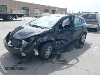 2014 Toyota Prius One z VIN JTDKDTB33E1569335, wystawiony jako IAAI lot #42483772 z przebiegiem Nie podano mil oraz . Historia ofert i sprzedaży dostępna na DreamBid. Obrazek 17.