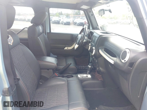 2012 Jeep Wrangler Arctic with VIN 1C4GJWBG3CL172602, listed as a IAAI auction lot 42154652 with 71,470 mi miles and . Bid and sale history available at DreamBid. Image 5.