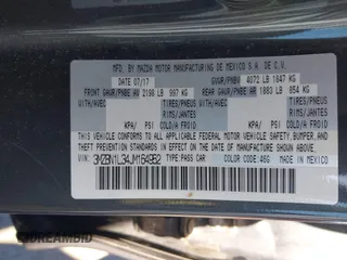2018 Mazda 3 Touring with VIN 3MZBN1L34JM164952, listed as a IAAI auction lot 42179420 with 106,706 mi miles and . Bid and sale history available at DreamBid. Image 9.