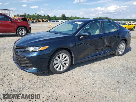 2018 Toyota Camry LE with VIN 4T1B11HK0JU565596, listed as a Copart auction lot 60219235 with 9,809 mi miles and Salvage title. Bid and sale history available at DreamBid. Image 1.