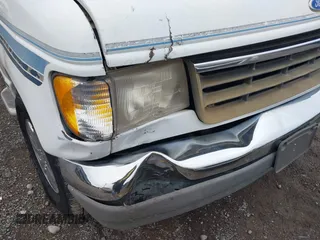1996 Ford Econoline Cargo with VIN 1FDEE14N7THA03059, listed as a IAAI auction lot 41217045 with 139,435 mi miles and . Bid and sale history available at DreamBid. Image 6.