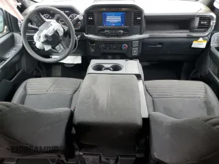 2023 Ford F-150 XL with VIN 1FTEW1EP5PKF67674, listed as a Copart auction lot 50348795 with 23,176 mi miles and Salvage title. Bid and sale history available at DreamBid. Image 8.