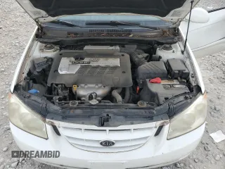 2006 Kia Spectra EX with VIN KNAFE121265208526, listed as a Copart auction lot 80300604 with 101,780 mi miles and Salvage Title. Bid and sale history available at carsss.com. Image 11.