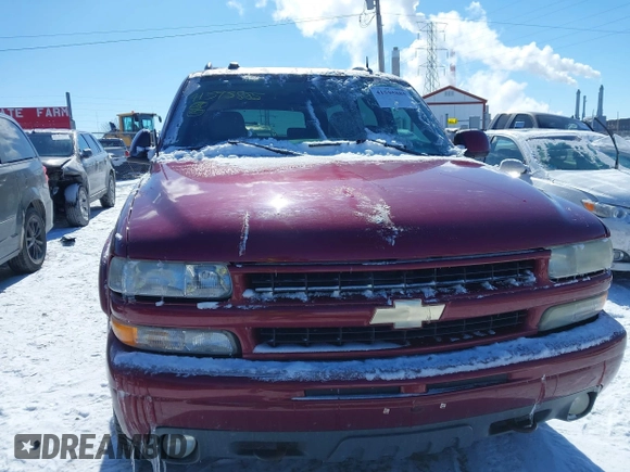 2004 Chevrolet Suburban Z71 with VIN 3GNFK16Z84G231091, listed as a IAAI auction lot 41595885 with 101,243 mi miles. Bid and sale history available at carsss.com. Image 12.