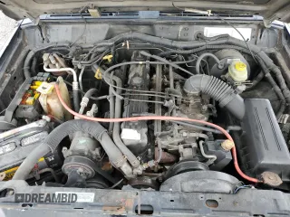 2000 Jeep Cherokee with VIN 1J4FT48S3YL139915, listed as a Copart auction lot 69840924 with 249,720 mi miles and Salvage title. Bid and sale history available at DreamBid. Image 12.