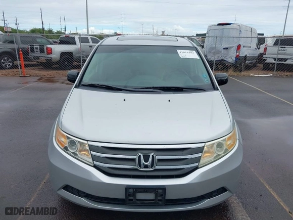 2012 Honda Odyssey EX-L with VIN 5FNRL5H68CB056567, listed as a IAAI auction lot 41014382 with 101,885 mi miles. Bid and sale history available at carsss.com. Image 6.