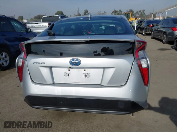 2016 Toyota Prius Two z VIN JTDKBRFU1G3016850, wystawiony jako IAAI lot #41163246 z przebiegiem 68 858 mil mil oraz . Historia ofert i sprzedaży dostępna na DreamBid. Obrazek 16.