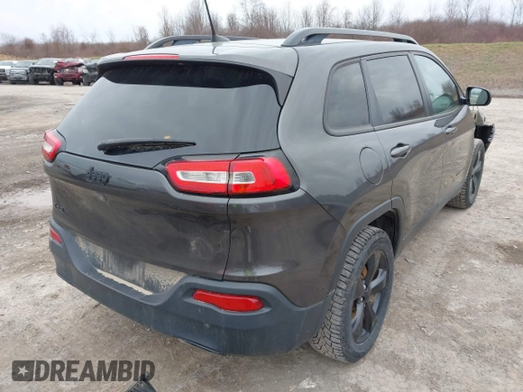 2016 Jeep Cherokee 75th Anniversary with VIN 1C4PJMCB0GW156076, listed as a IAAI auction lot 41946760 with 105,571 mi miles. Bid and sale history available at carsss.com. Image 4.