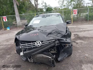 2013 Volkswagen Passat SE w/Sunroof with VIN 1VWBH7A33DC150043, listed as a IAAI auction lot 41411518 with 132,208 mi miles. Bid and sale history available at carsss.com. Image 13.