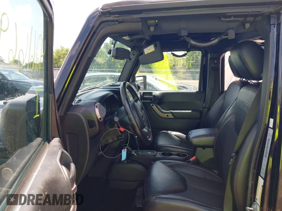 2017 Jeep Wrangler Unlimited Sahara with VIN 1C4BJWEGXHL520182, listed as a IAAI auction lot 42616692 with 88,169 mi miles and . Bid and sale history available at DreamBid. Image 5.