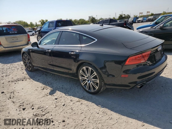 2015 Audi A7 3.0 Prestige with VIN WAU2GAFCXFN009065, listed as a Copart auction lot 72945554 with 127,690 mi miles and Salvage Title. Bid and sale history available at carsss.com. Image 2.