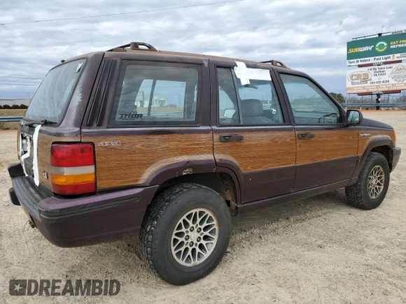 1993 Jeep Grand Wagoneer z VIN 1J4GZ88Y6PC711184, wystawiony jako Copart lot #46785895 z przebiegiem 280 127 mil mil oraz Czysty tytuł • Clean title. Historia ofert i sprzedaży dostępna na DreamBid. Obrazek 3.
