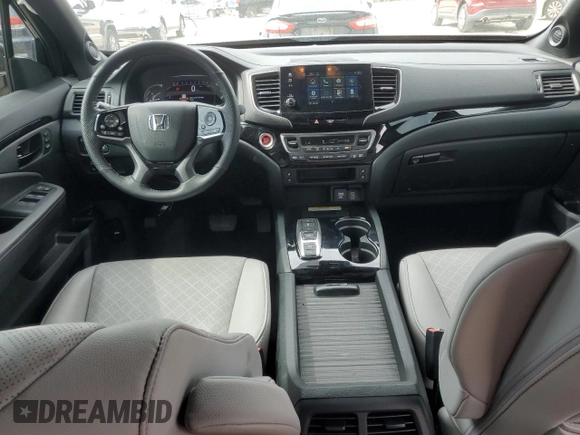 2023 Honda Passport Elite with VIN 5FNYF8H07PB036929, listed as a Copart auction lot 55981185 with 27,523 mi miles and Salvage title. Bid and sale history available at DreamBid. Image 8.