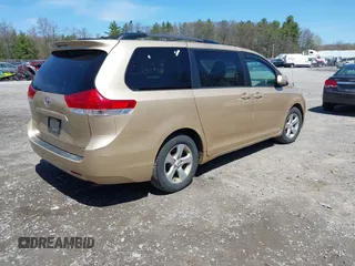 2012 Toyota Sienna LE AAS with VIN 5TDKK3DC9CS184090, listed as a IAAI auction lot 42123891 with 162,065 mi miles. Bid and sale history available at carsss.com. Image 4.