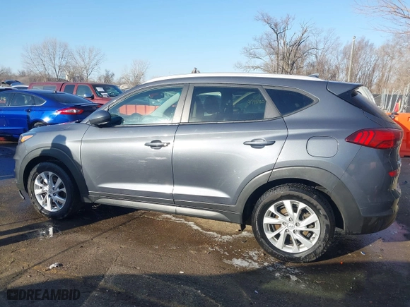 2019 Hyundai Tucson Value with VIN KM8J33A49KU860842, listed as a IAAI auction lot 41735224 with 57,197 mi miles. Bid and sale history available at carsss.com. Image 14.