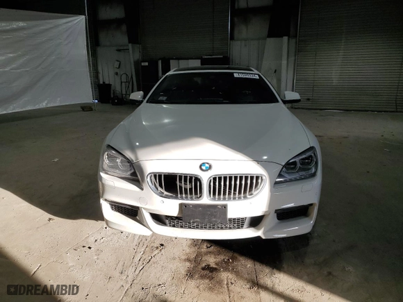 2015 BMW 6 Series 650i xDrive with VIN WBA6B4C56FD761374, listed as a Copart auction lot 41599334 with 63,057 mi miles and Salvage Title. Bid and sale history available at carsss.com. Image 5.