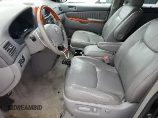 2010 Toyota Sienna XLE with VIN 5TDDK4CC5AS032739, listed as a Copart auction lot 55212585 with 200,316 mi miles and Salvage title. Bid and sale history available at DreamBid. Image 7.
