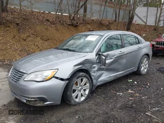 2014 Chrysler 200 Touring with VIN 1C3CCBBB1EN165049, listed as a IAAI auction lot 42005572 with 117,673 mi miles and . Bid and sale history available at carsss.com. Image 2.