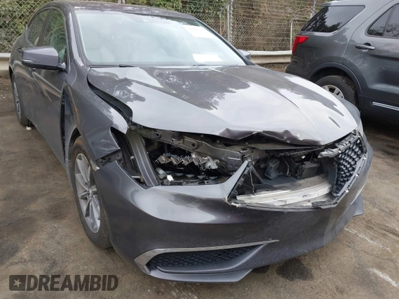 2019 Acura TLX with VIN 19UUB1F36KA004085, listed as a IAAI auction lot 41664344 with 115,125 mi miles. Bid and sale history available at carsss.com. Image 6.