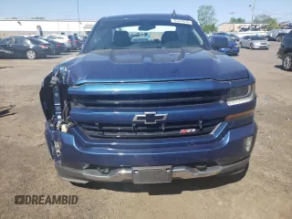 2017 Chevrolet Silverado 1500 LT with VIN 1GCVKREC2HZ372079, listed as a Copart auction lot 55375635 with 84,762 mi miles and Salvage Title. Bid and sale history available at DreamBid. Image 5.