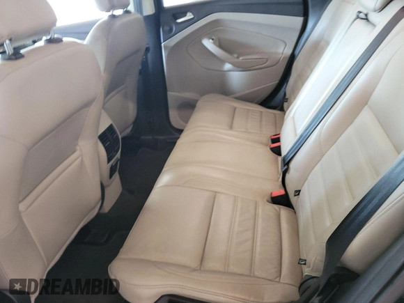 2019 Ford Escape Titanium with VIN 1FMCU9J96KUA01051, listed as a IAAI auction lot 42841649 with 69,720 mi miles and . Bid and sale history available at DreamBid. Image 32.