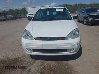 2001 Ford Focus ZX3 z VIN 3FAFP31381R210045, wystawiony jako IAAI lot #41912083 z przebiegiem 52 931 mil mil oraz . Historia ofert i sprzedaży dostępna na DreamBid. Obrazek 6.