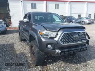 2018 Toyota Tacoma SR with VIN 3TMCZ5AN9JM136622, listed as a IAAI auction lot 42532566 with 93,321 mi miles and . Bid and sale history available at DreamBid. Image 1.