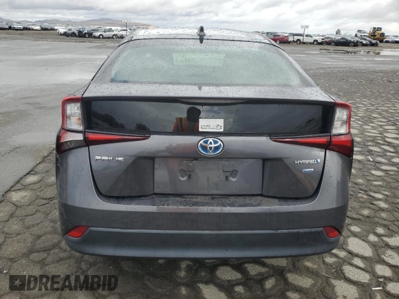 2020 Toyota Prius L Eco с VIN JTDKARFU1L3121224, выставлен на аукционе Copart как лот 56697845 с пробегом 94 621 миль миль и Списание • Salvage title. История ставок и продаж доступна на DreamBid. Изображение 6.