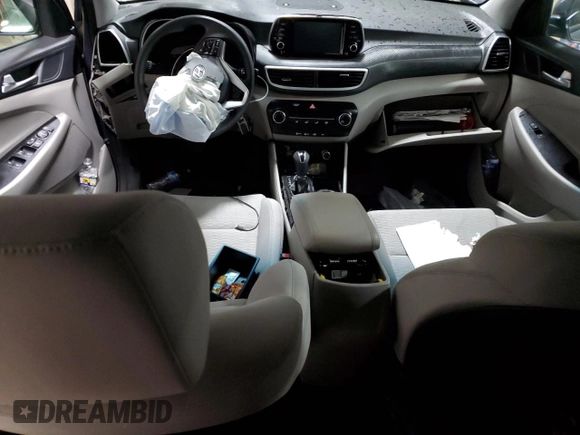 2019 Hyundai Tucson SE with VIN KM8J2CA43KU992708, listed as a Copart auction lot 57104054 with 0 mi miles and Non Repairable. Bid and sale history available at carsss.com. Image 8.