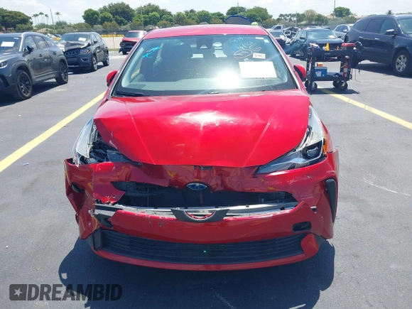 2021 Toyota Prius L Eco with VIN JTDKAMFU4M3145215, listed as a IAAI auction lot 42281566 with 74,220 mi miles and . Bid and sale history available at DreamBid. Image 11.