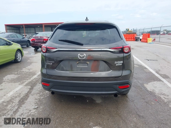 2017 Mazda CX-9 Touring z VIN JM3TCACY7H0129335, wystawiony jako IAAI lot #42289926 z przebiegiem 60 425 mil mil oraz . Historia ofert i sprzedaży dostępna na DreamBid. Obrazek 17.