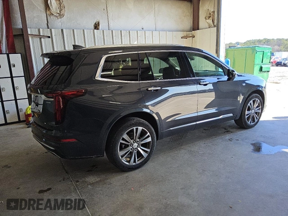 2021 Cadillac XT6 Premium Luxury z VIN 1GYKPDRS7MZ179150, wystawiony jako Copart lot #44894625 z przebiegiem 48 869 mil mil oraz Czysty tytuł • Clean title. Historia ofert i sprzedaży dostępna na DreamBid. Obrazek 3.