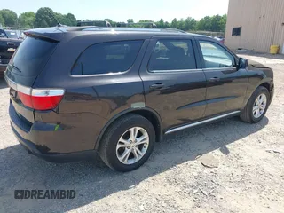 2013 Dodge Durango SXT with VIN 1C4RDJAG7DC580249, listed as a IAAI auction lot 42535723 with 199,626 mi miles and . Bid and sale history available at DreamBid. Image 4.