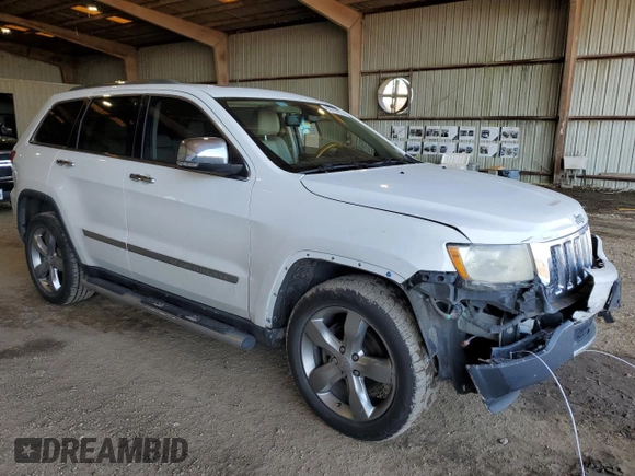 2013 Jeep Grand Cherokee Overland with VIN 1C4RJECG3DC620999, listed as a Copart auction lot 88298985 with 182,219 mi miles and Salvage Title. Bid and sale history available at carsss.com. Image 4.