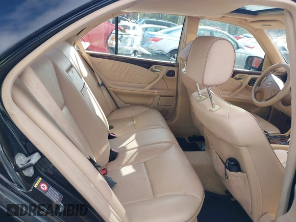 2000 Mercedes-Benz E-Class with VIN WDBJF82J2YX037818, listed as a IAAI auction lot 41910044 with 163,240 mi miles. Bid and sale history available at carsss.com. Image 8.