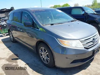 2011 Honda Odyssey EX-L with VIN 5FNRL5H62BB071404, listed as a IAAI auction lot 42196826 with 278,657 mi miles and . Bid and sale history available at carsss.com. Image 1.